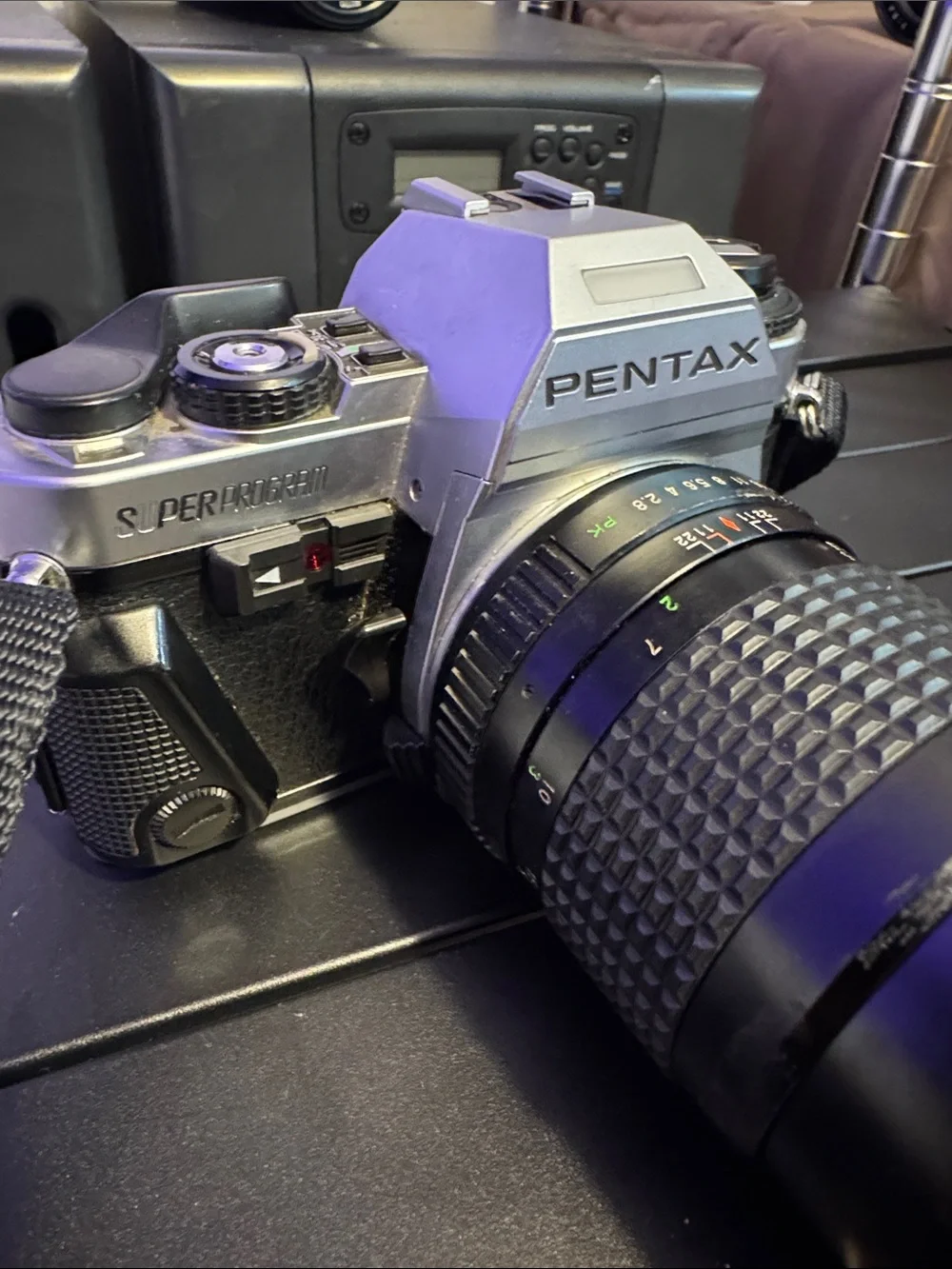 Pentax Silver and Black SLR with 135mm Telephoto Lens